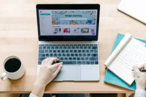 person creating a social media strategy with the laptop open